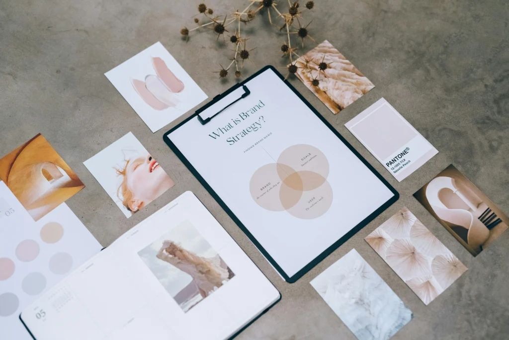 Color swatches and moodboard inspiration laid out for web design planning