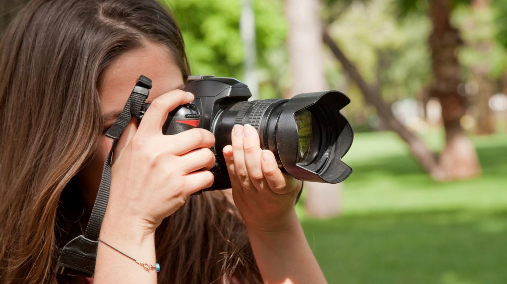 Image of a photographer taking a picture.