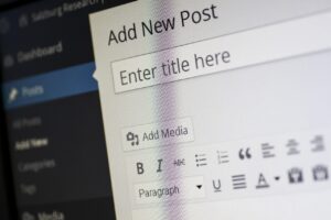 Close-up view of the WordPress editor screen showing “Add New Post” and formatting toolbar for creating website content