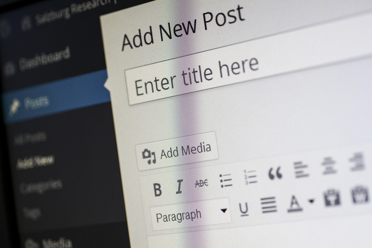 Close-up view of the WordPress editor screen showing “Add New Post” and formatting toolbar for creating website content